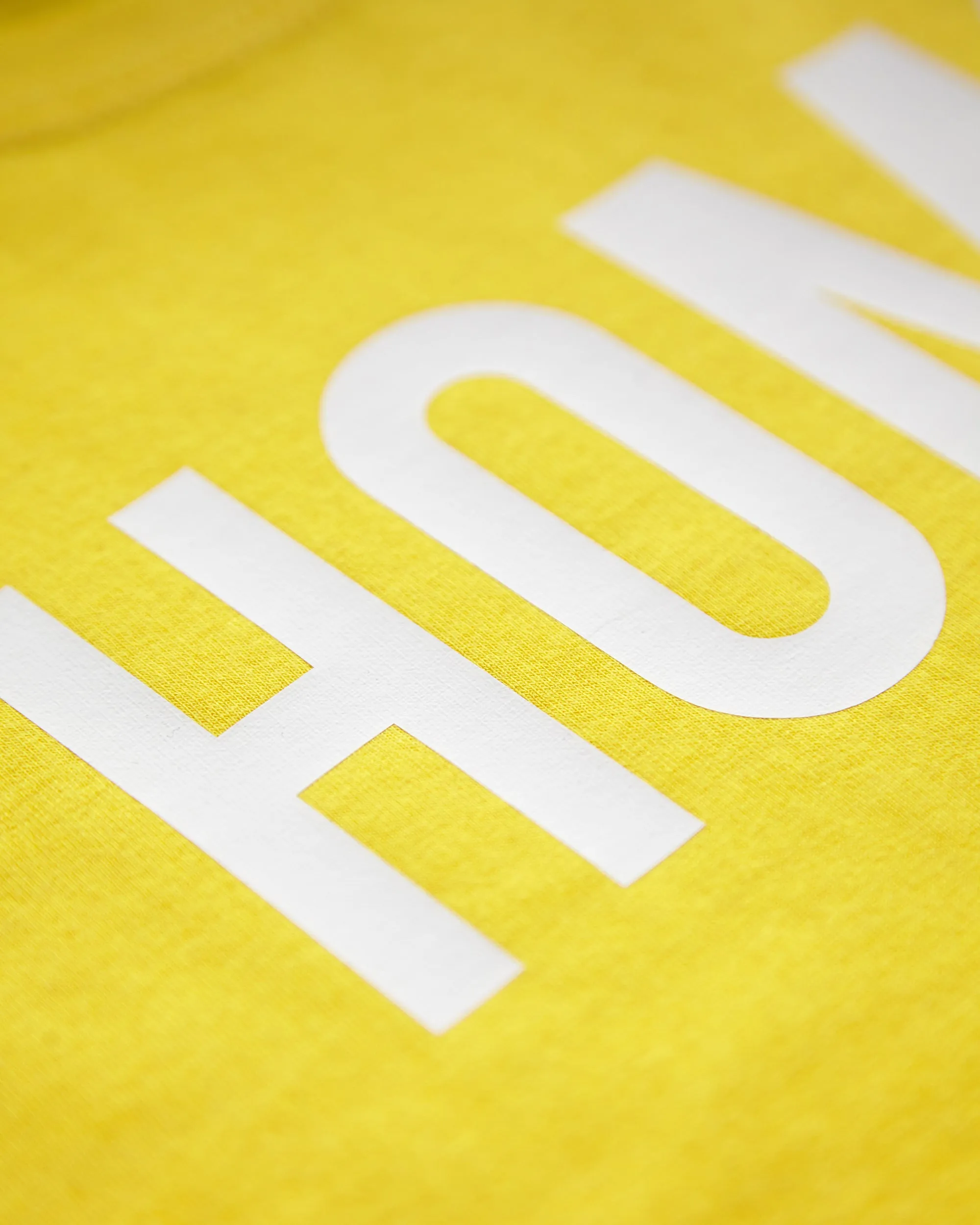 HOMO white on yellow - mens sleeveless crop top.