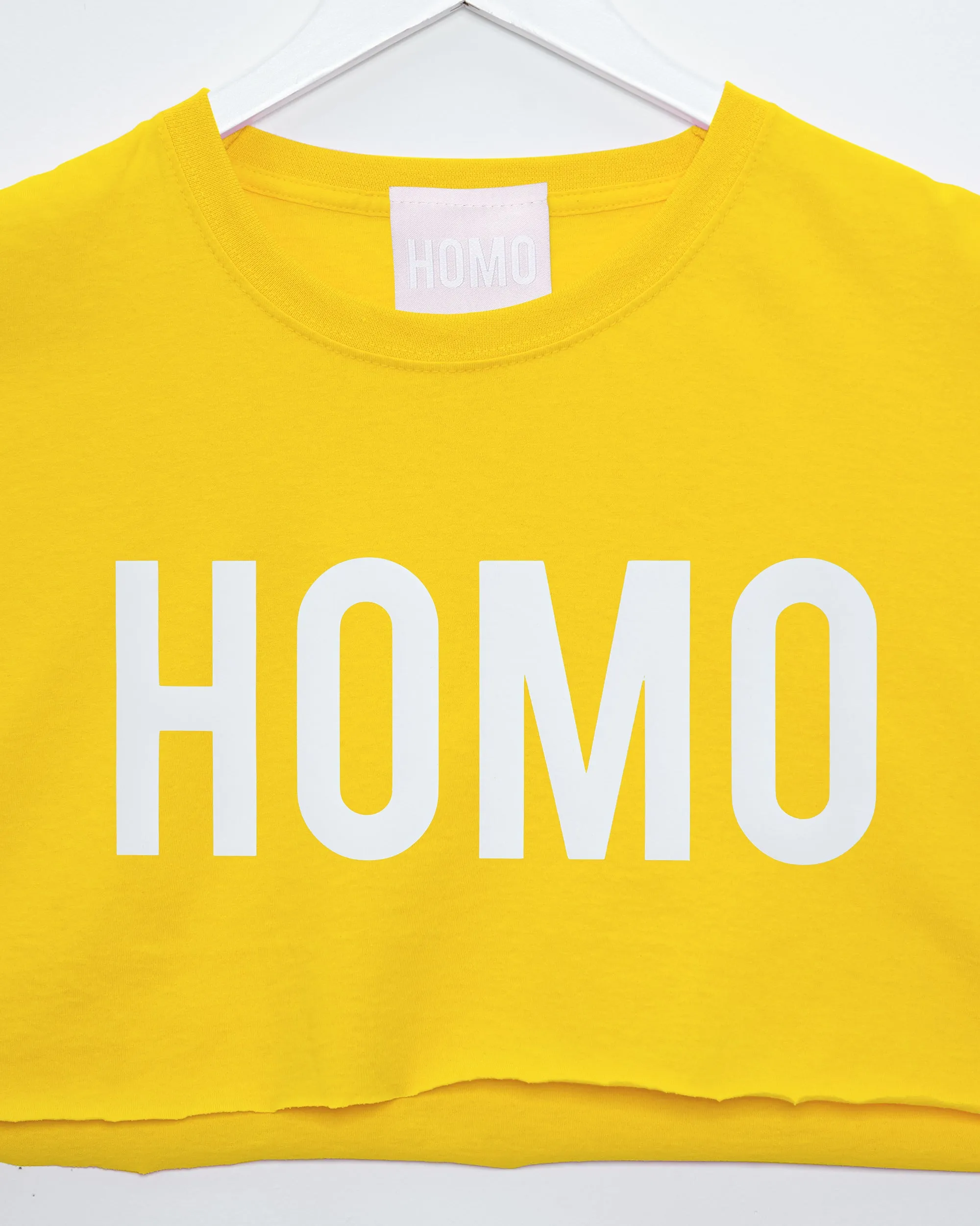 HOMO white on yellow - mens sleeveless crop top.
