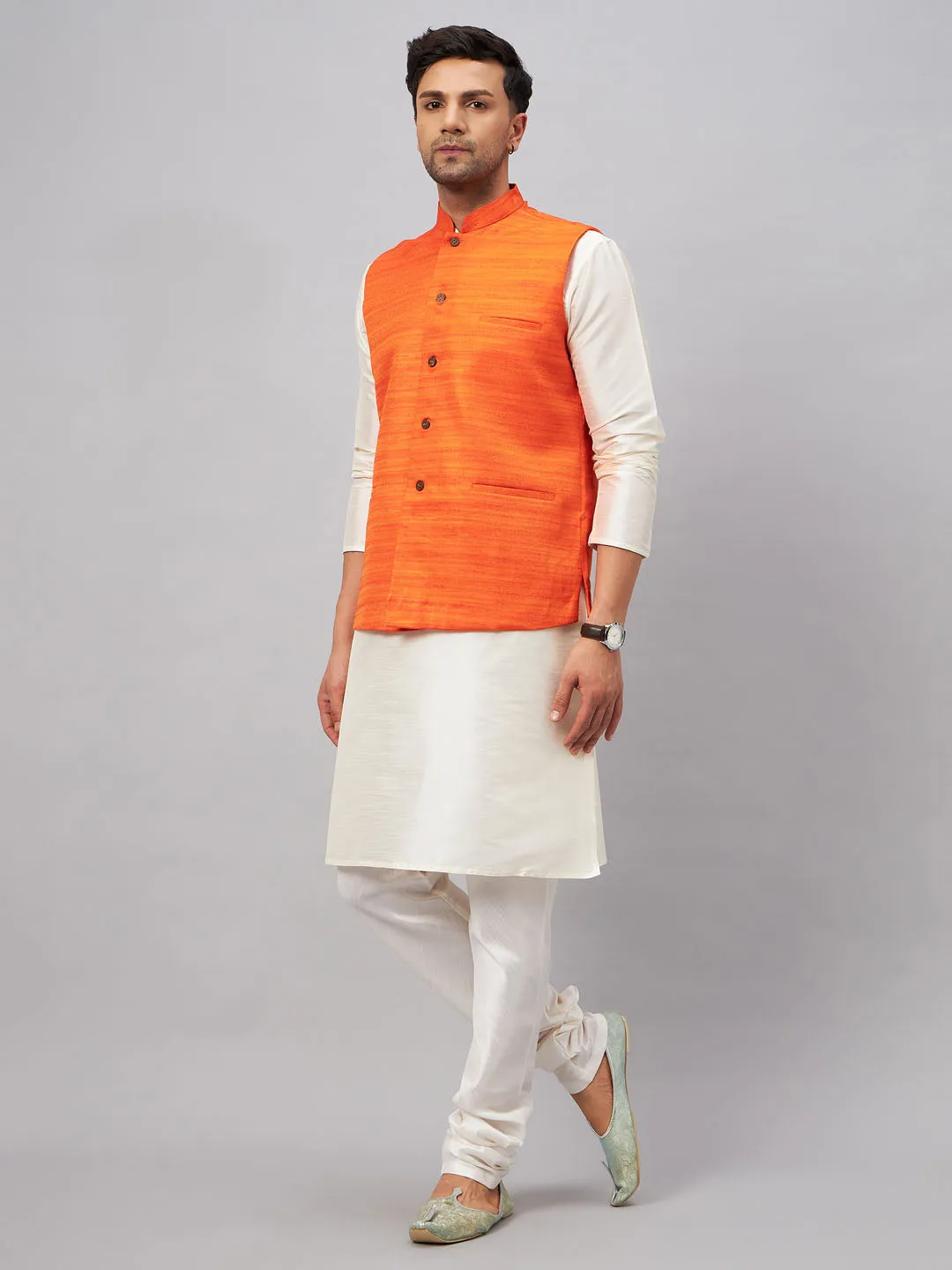 Jashvi Men's Orange Matka Silk Nehru Jacket With Cream Silk Blend Kurta Pyjama Set