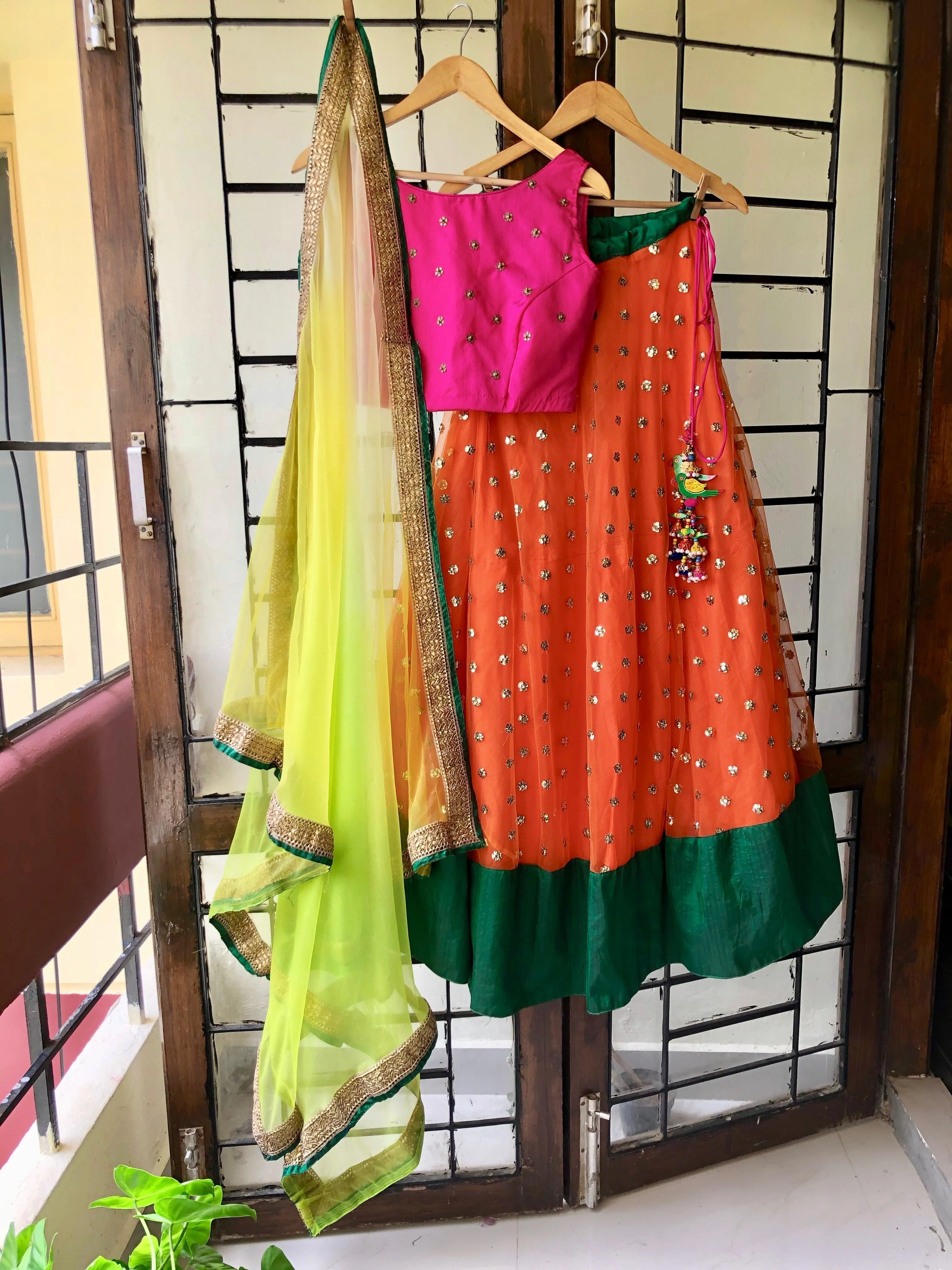 Orange Brunch crop top with netted skirt and duppata